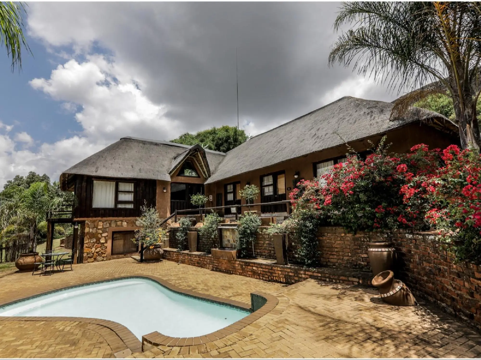 Karee: rustic rooms round a pool, a lounge, a coffee bar and a boma
